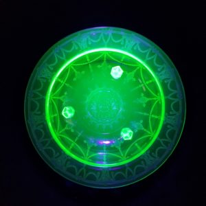 Bright green uranium glass when it's exposed to UV light.